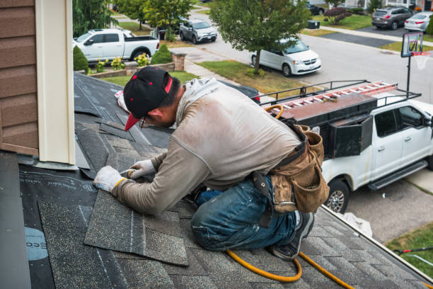 Professional Roofing technician working in River Falls, WI